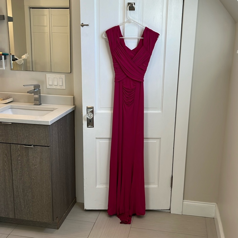 Pink full length gown with cutout back